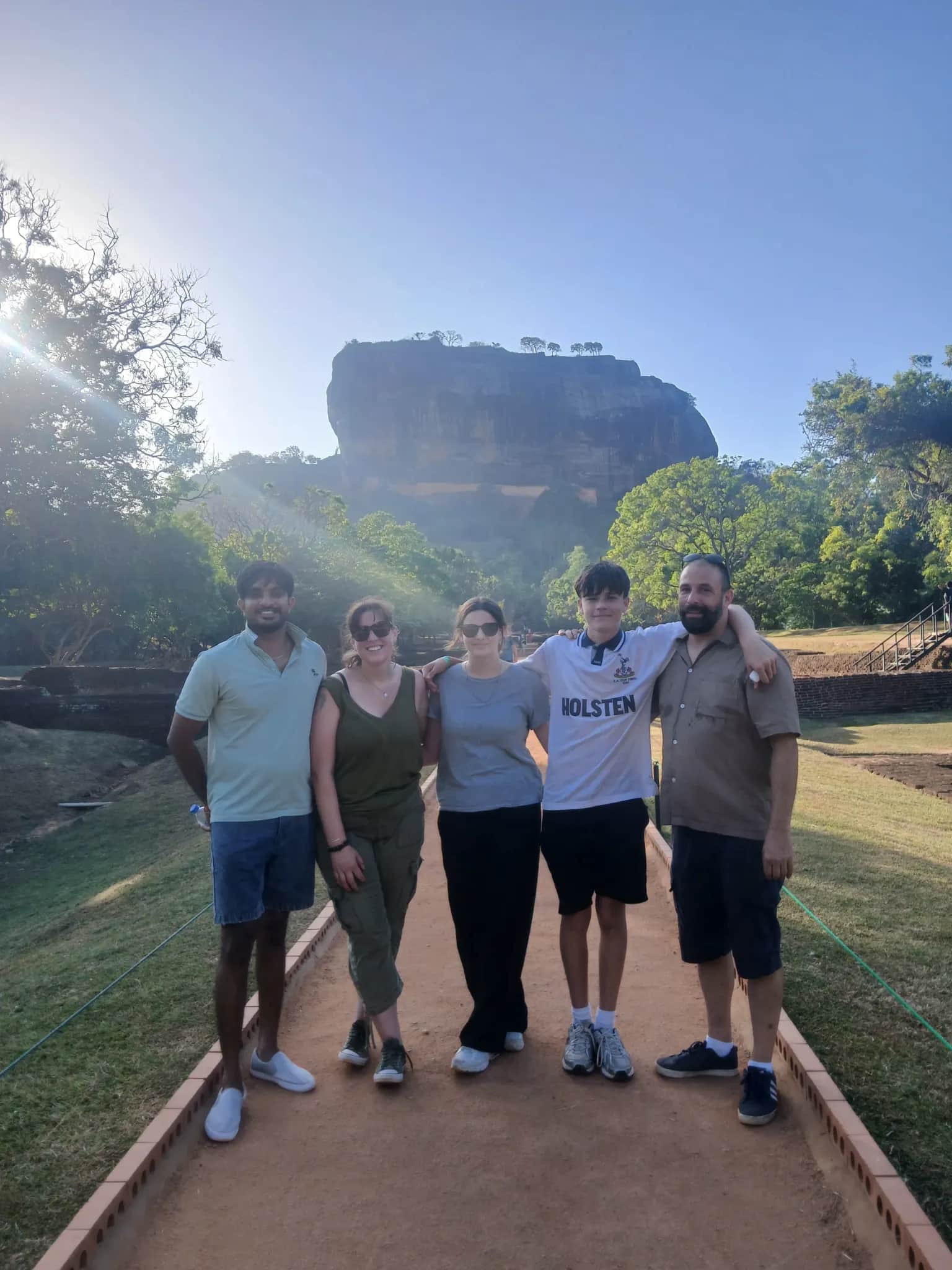 Sigiriya Lion Rock fortress rising above the plain, with CeilonTravels guide Sachin Dilshan