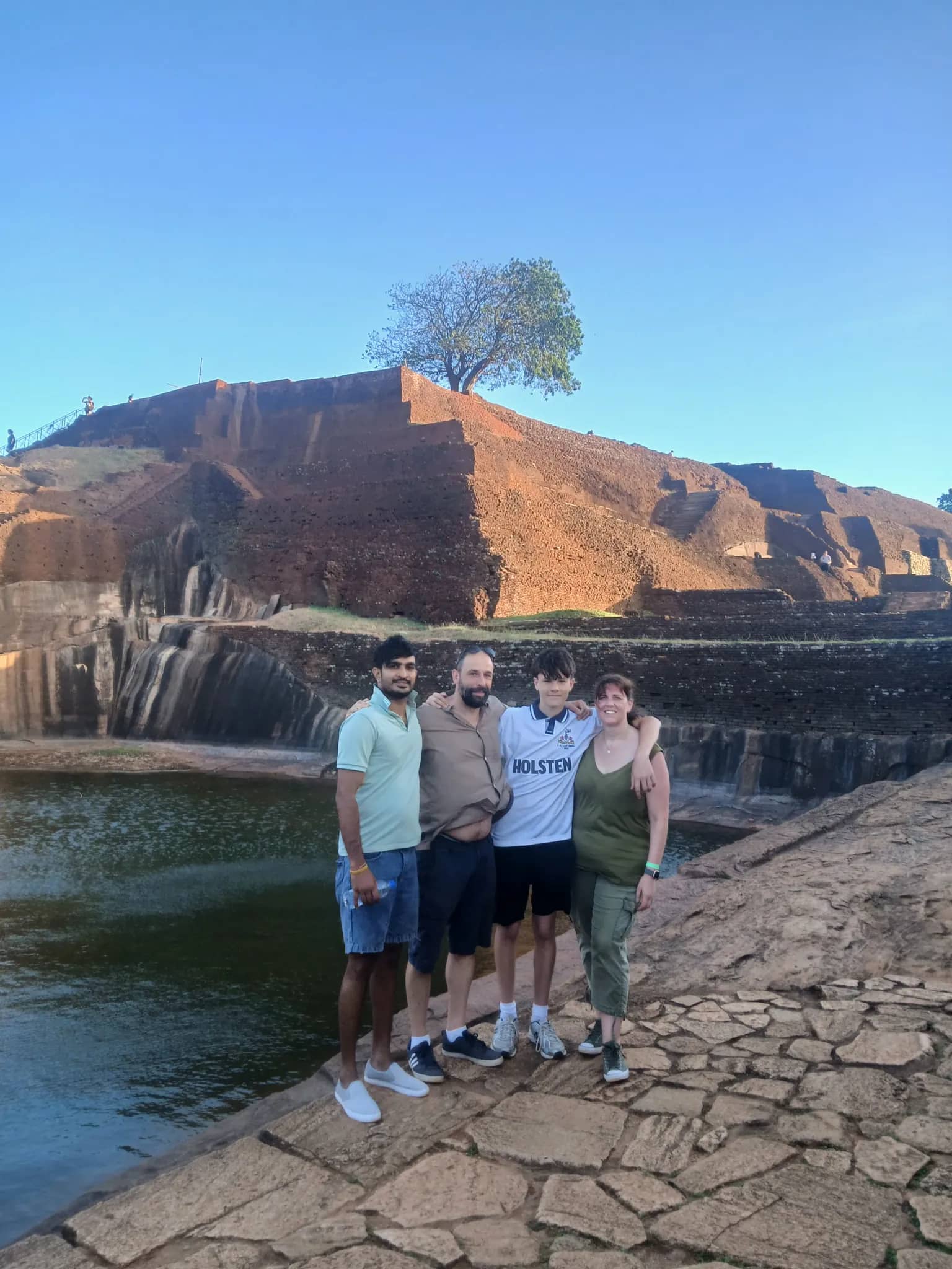 Traveller looking out over the view from the summit of Sigiriya Rock