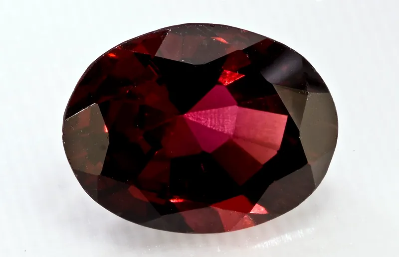 A deep red almandine garnet crystal