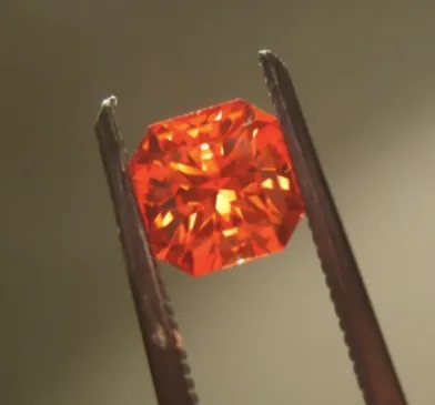 A padparadscha sapphire showing its characteristic pink-orange lotus colour